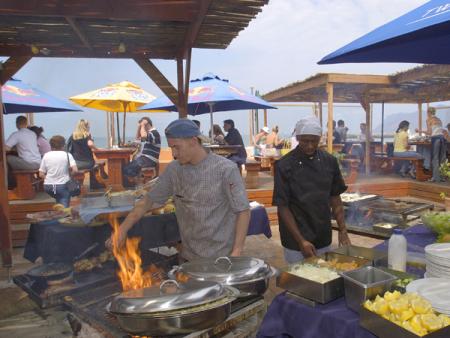 the brass bell in kalk bay
