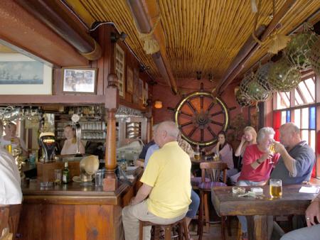 the brass bell in kalk bay